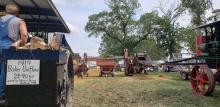 Two steam engines threshing